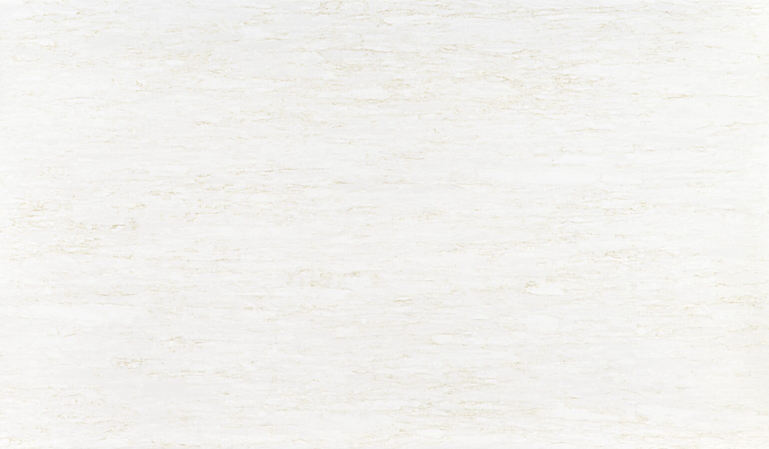 Lunar Gold quartz surface with creamy white background and soft gold veining